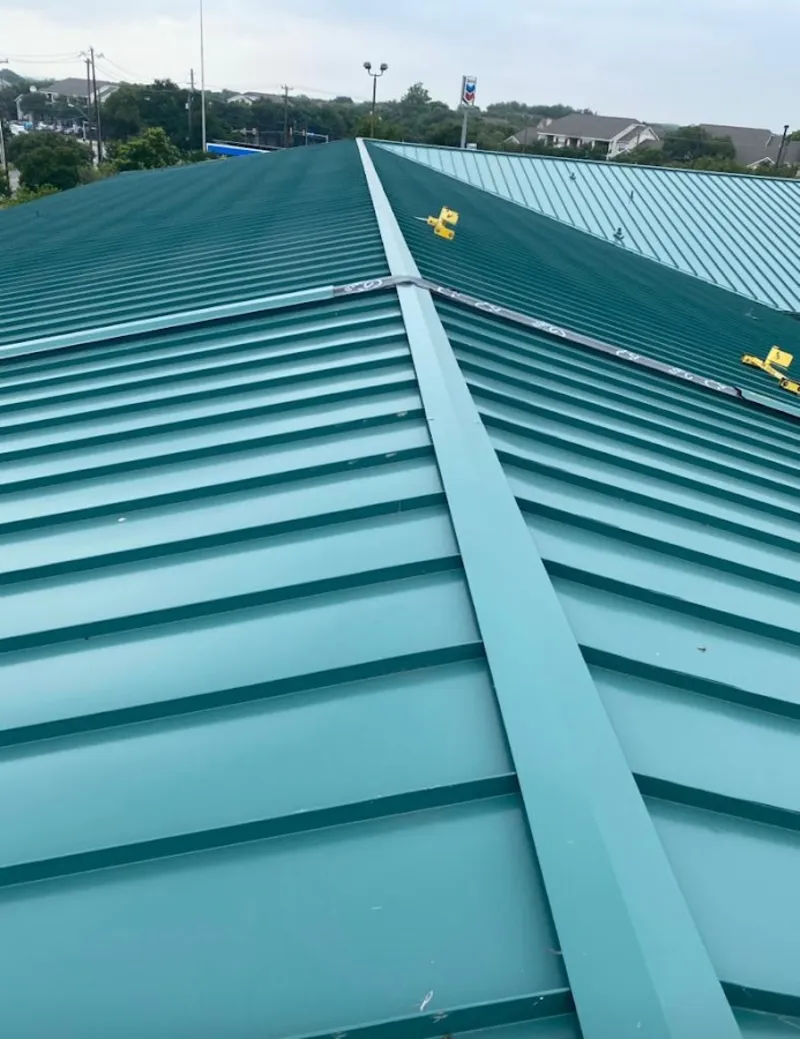 Green commercial metal roof ridge and valley for Metal Roof Repair in San Mateo